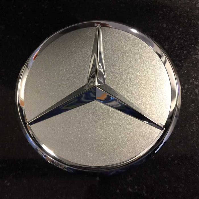 Silver metallic with chrome star Mercedes-Benz center cap OEM original